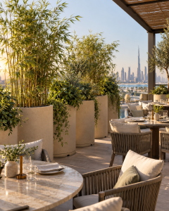 Tall GRP planters with dense planting screening a rooftop restaurant terrace from the breeze